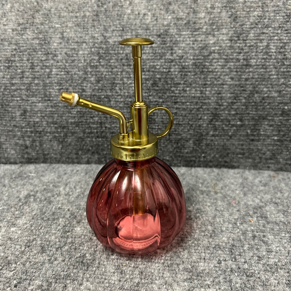 True Living Glass Plant Mister Pink Ribbed Bottle Gold Pump Indoor Garden Decor